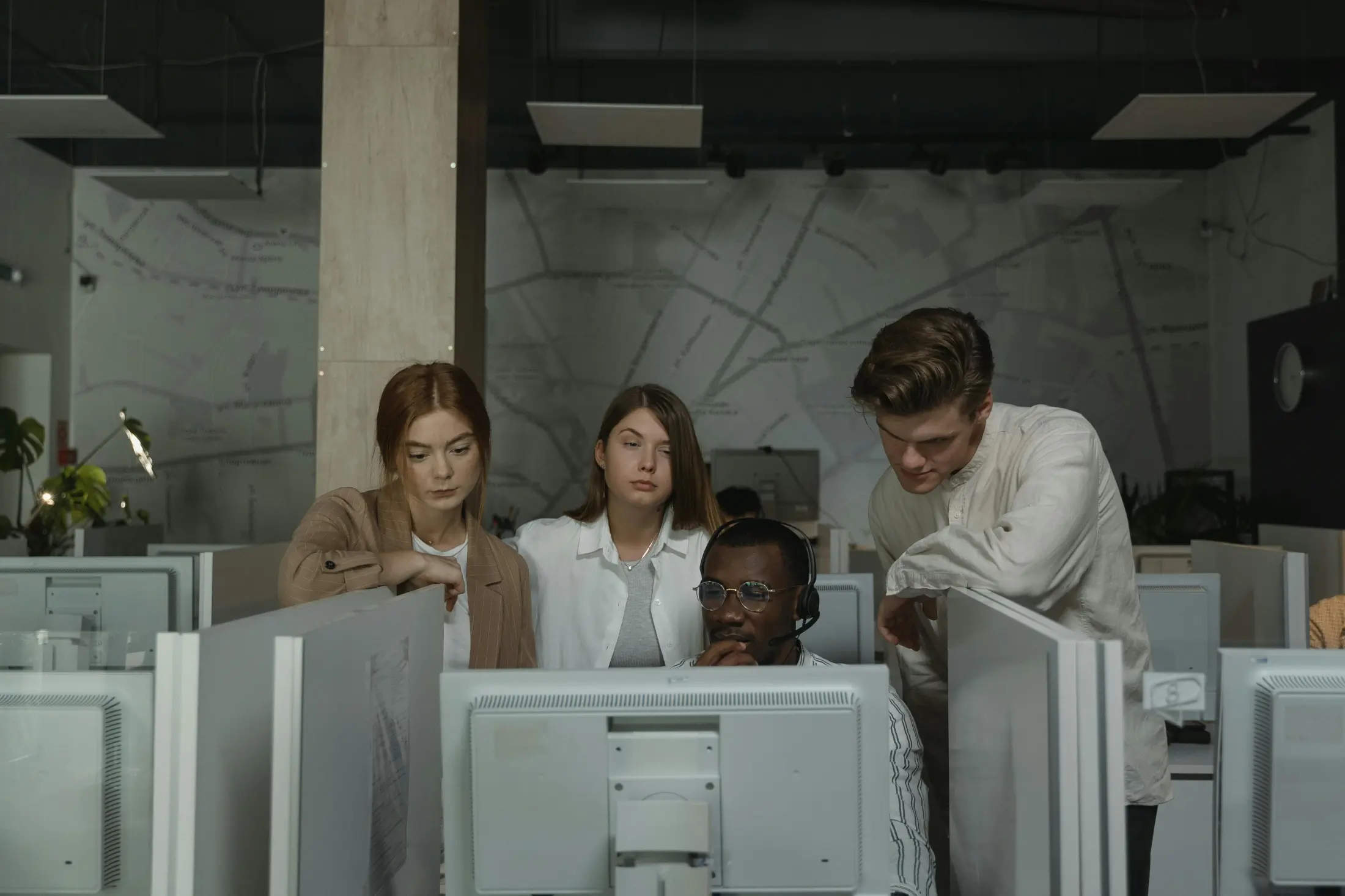 Technical support team working in an operations center