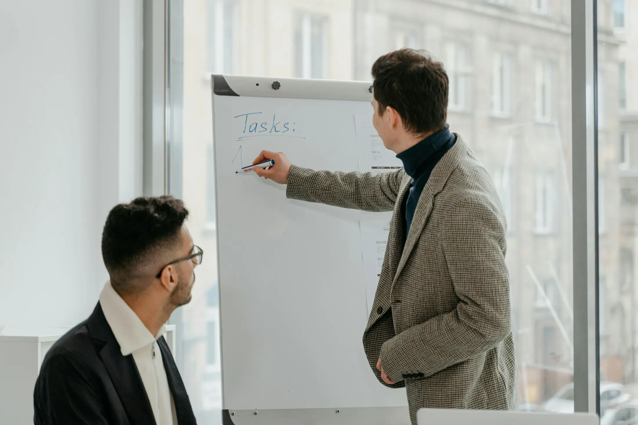 Consulting team preparing a technology roadmap for phased execution